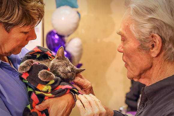 Dick Goddard showing love for the animals!